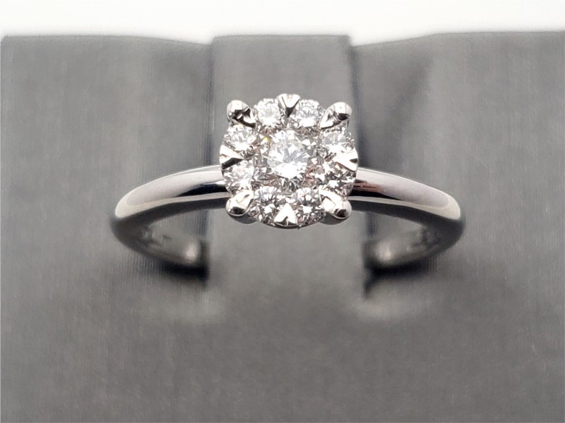 solitaire cluster diamond ring